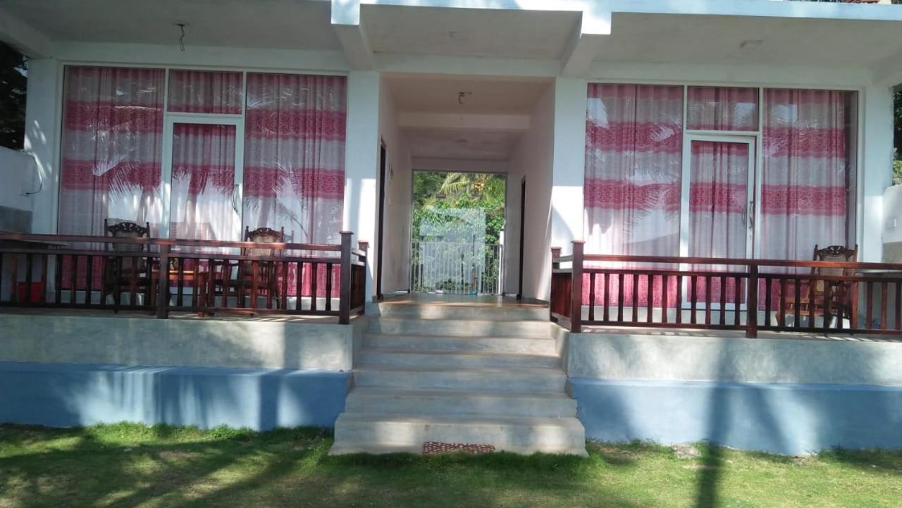 Ocean Breeze Villa Boossa Bagian luar foto